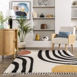 NuLOOM Stefanie Abstract Shapes Tassel Area Rug 16 NuLOOM Stefanie Abstract Shapes Tassel Area Rug -Home Furnishing Store GUEST 1dc7b0df 6152 4acb a0e3 a9a9149d22d5