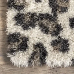 Kenina Leopard Shag Area Rug -Home Furnishing Store GUEST 6c60b738 73d7 4111 8e75 136ec9a55a9e